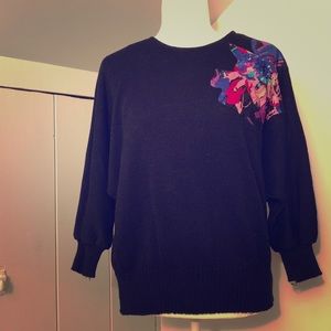 Vintage 80s style sweater with floral appliqué